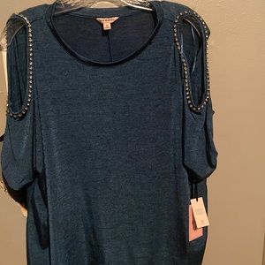 Juicy Couture size medium , open shoulder , shirt .